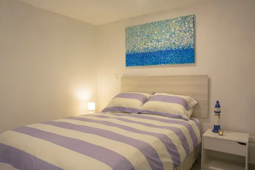 Dormitorio principal del Departamento 1 con cama matrimonial